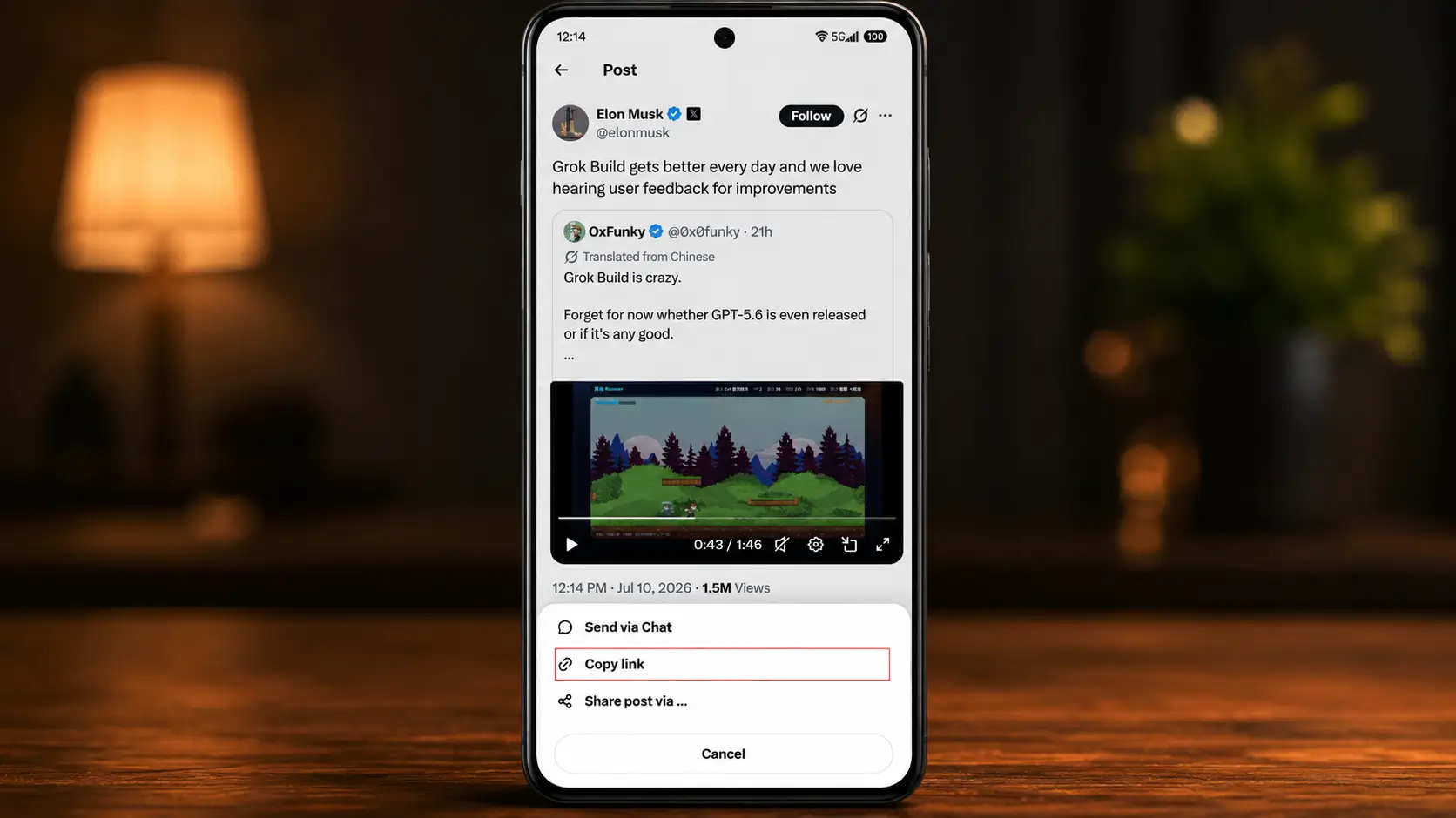 Tap the Share icon and select Copy Link.